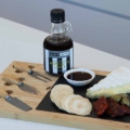 Black by Whyte Worchester Sauce on Bamboo & Slate Cheese Board with cheese & biscuits